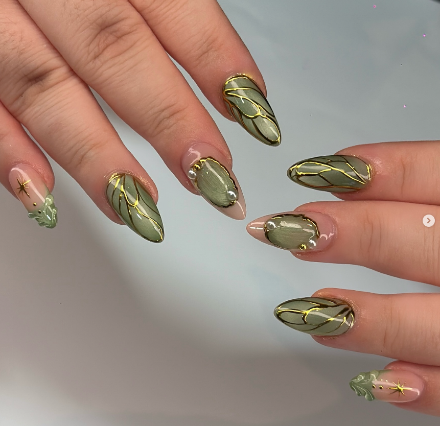 Green and gold custom leaf nail art at Jovial Beauty