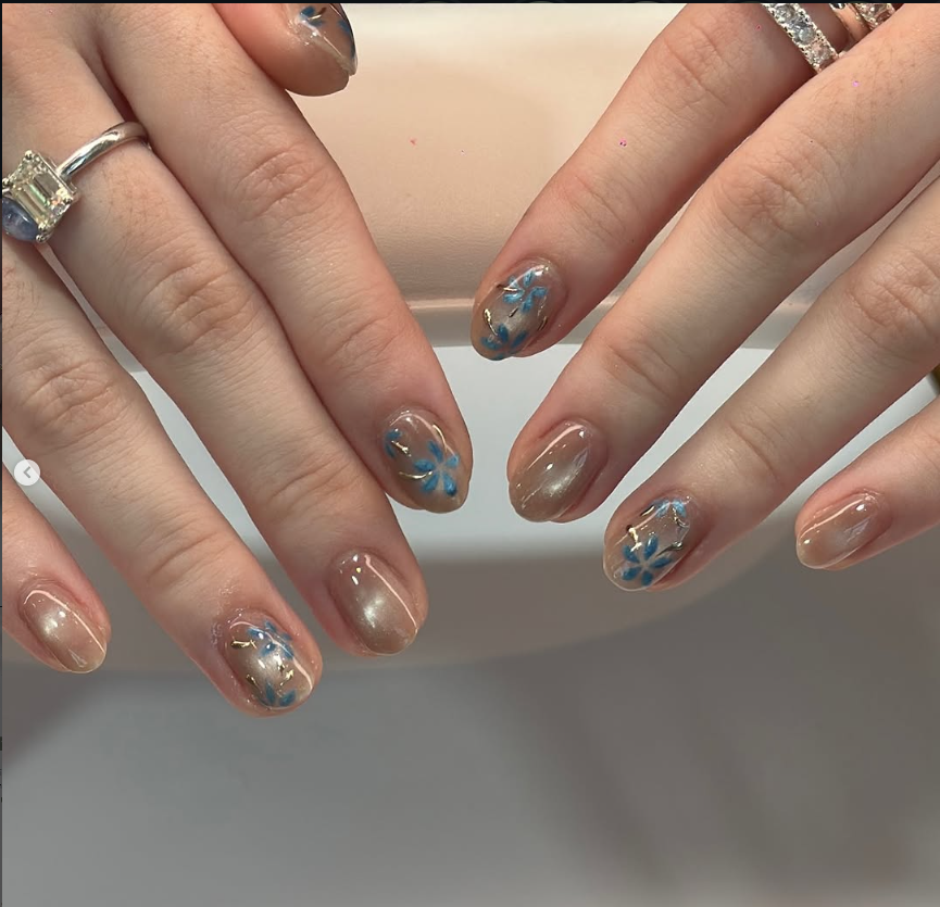 Blue floral short nail art at Jovial Beauty