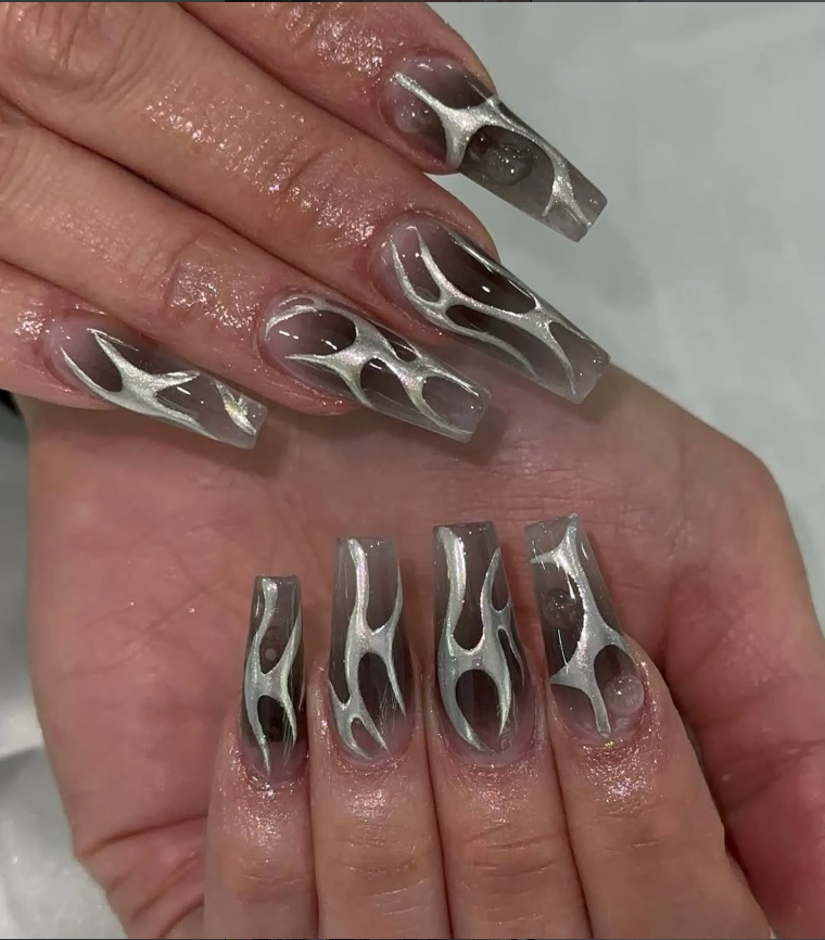 Silver chrome sculpted nail extensions at Jovial Beauty